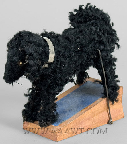 Antique Squeak Toy, Shaggy Black Dog, angle view